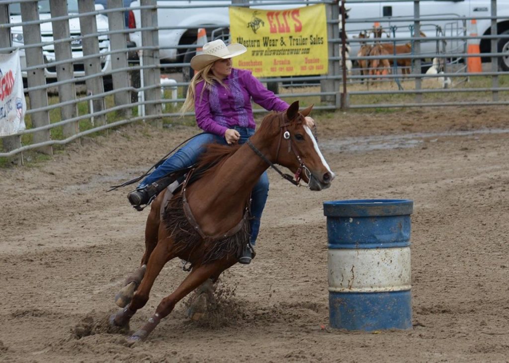 woman competing in a horse contest