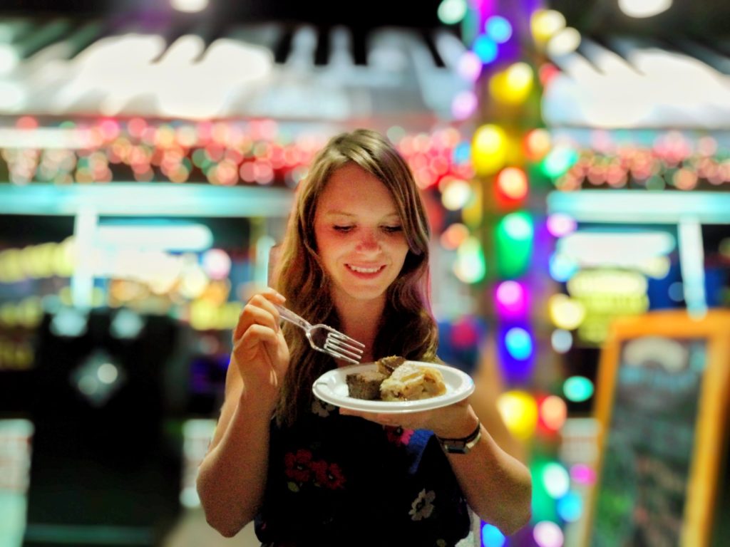 woman enjoying food at the festival