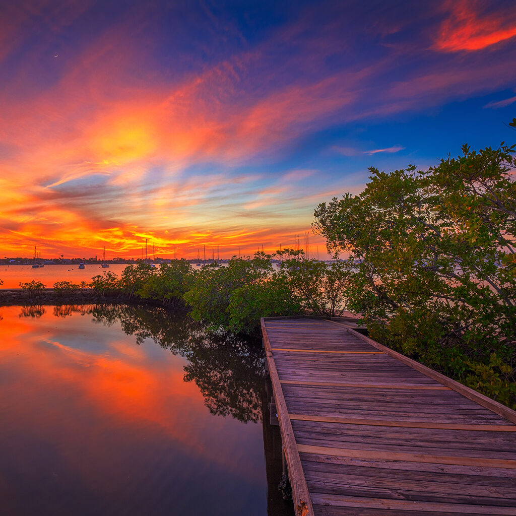 sunset at a wooden dock